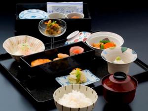 【和食レストラン「真南風」】和食レストランの朝食。ご飯とお粥が選べる身体にやさしい和定食。