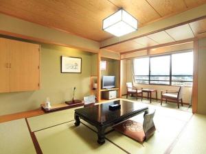 飛騨の町並みと山並みを望む和室10畳のお部屋（例）