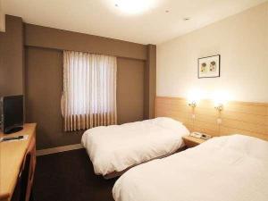 広さ：22平米　シモンズベッド サイズ：120×200×2台