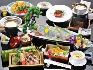活きイカ＆活き鮑料理イメージ（写真のイカは４名盛）