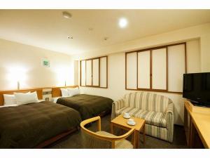 デラックスツイン。エキストラベッドを追加して3名様でもご利用いただけます。