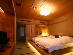 56平米の洋室。室内に備え付けている檜の内湯には、たっぷりと源泉がみたされています。