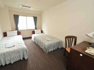 スタンダードツインルーム・・・少し広めのツインのお部屋です。