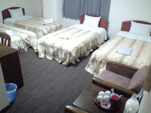 シングルベッドが4つのフォースのお部屋です。4名様でもゆったりご利用いただけます。