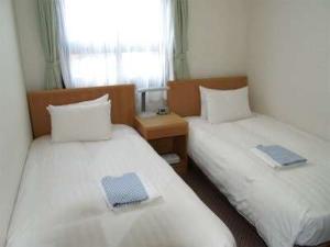 ツインルーム　（バス・トイレ付）デュベスタイル