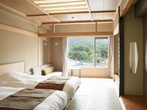 【山側】和室ツイン（客室一例）／表情豊かな阿寒の大自然をお愉しみくださいませ。