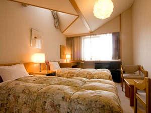 ツインルーム。お部屋のお風呂は温泉♪