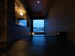 【別館／雅】展望風呂付和洋特別室／温泉展望風呂では、阿寒の四季を肌で感じる湯浴みを　※イメージ
