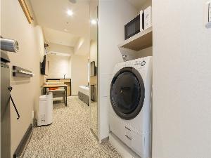 洗濯乾燥機と電子レンジを全部屋にご用意しております