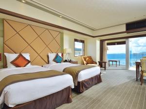 2ベッドルームのコーナースイート。ご家族やグループでもごゆっくりお寛ぎいただけます。