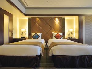 やんばるの大自然に囲まれた、59平米以上の広々客室でのんびりとした休日を。