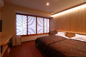 スタンダードツインのお部屋です。シモンズベッドを採用。