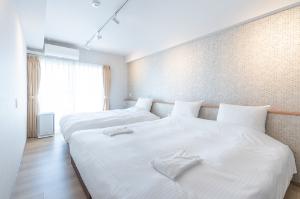 【デラックススイート】こちらはセカンドベッドルーム。大人数でのご旅行にもプライベートな空間を♪