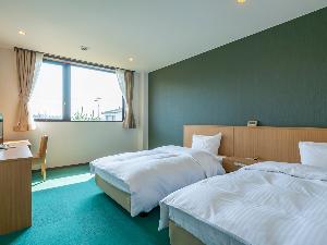 【スタンダードツインルーム】爽やかな緑の色合い、松島の自然をイメージしたお部屋