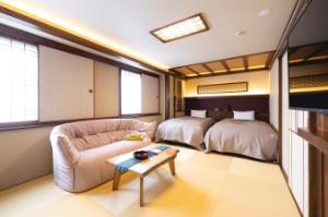 ５階・６階市街側温泉付きツイン【禁煙】 　眺望は、小樽市街側（小樽運河は望めません）  ご滞在中いつでもご入浴いただけるタイル張りの客室温泉をご用意
