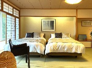 「つきあんこう」半露天風呂付の特別室ベッドルーム