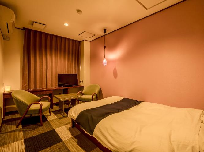 エコノミーシングルダブルベッド　※客室の一例