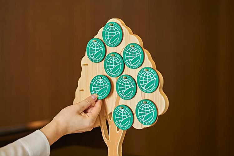 地球環境保護に配慮し、「グリーンコイン」制度を導入しております。年間で集計されたコイン枚数分の基金を地球の緑化活動へ寄付します。