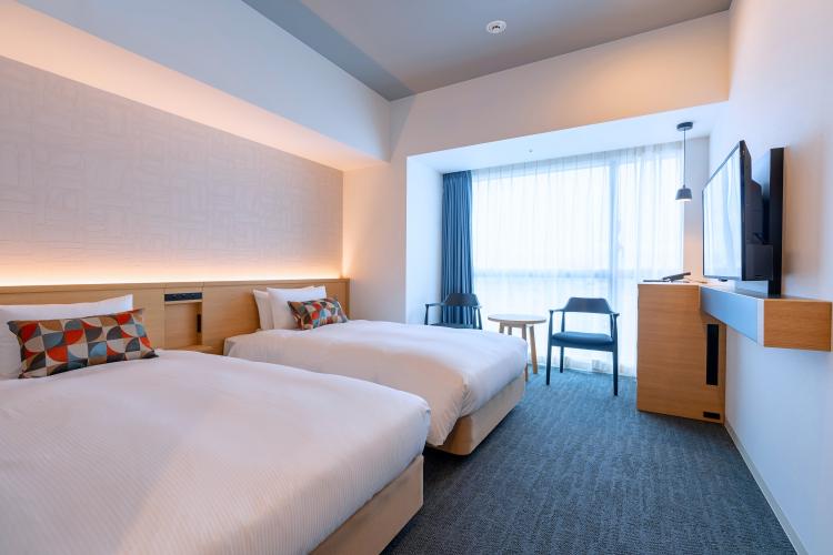 デラックスツイン／ハイフロア・スカイフロア（一例・家具などの仕様が異なる場合がございます）