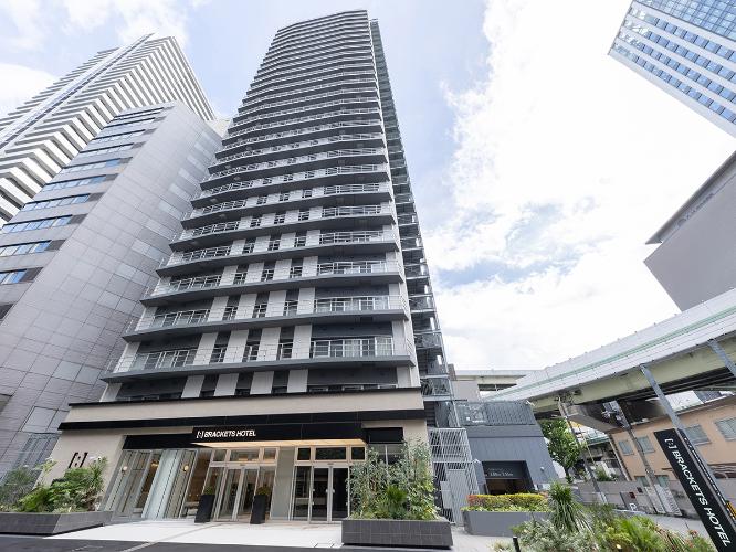 ホテル外観（昼）｜地上29階建ての高層ホテルです。