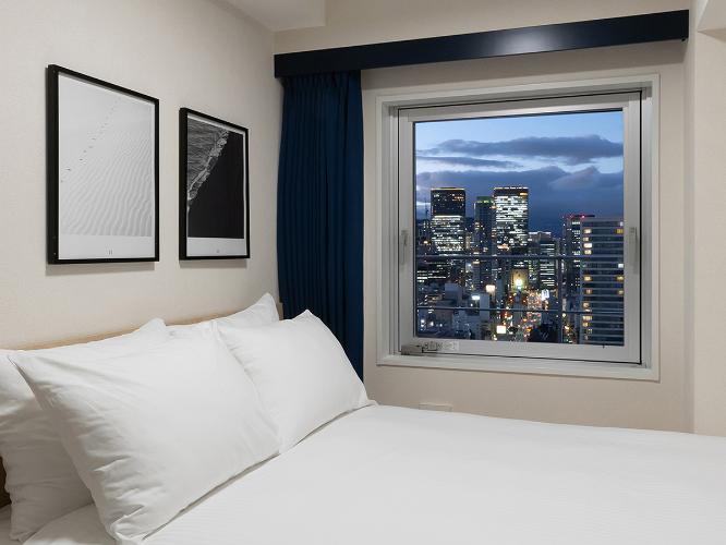 客室からの眺望｜上層階ならではの絶景。大阪の美しい夜景が、旅の思い出に。