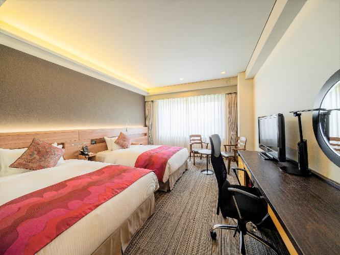 快適でゆとりのある空間に落ち着きあるインテリアを配したツインルーム