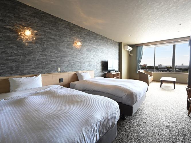 ジュニアスイート和洋室ツイン　※客室の一例